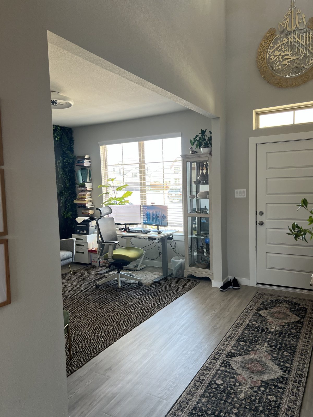 Open archway between the foyer and home office before the glass partition was installed