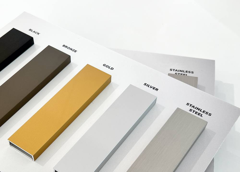 Five Anodized Finishes — Lightfall glass pivot door by Serene Glass, Houston TX