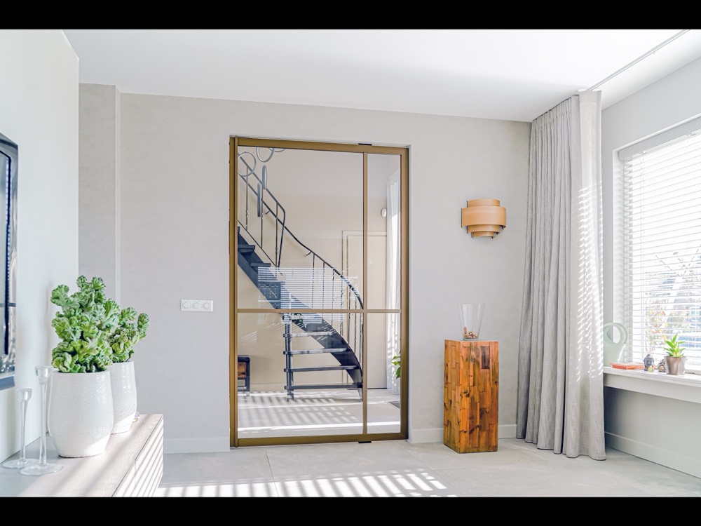 Bronze Anodized — Lightfall glass pivot door by Serene Glass, Houston TX