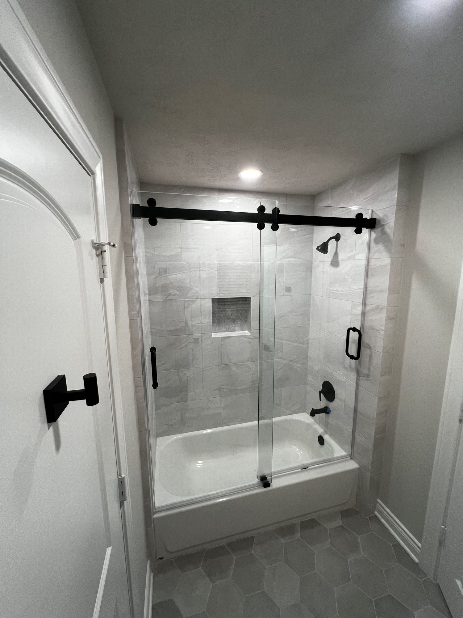 Frameless Sliding vs. Swinging Shower Doors: Which Should You Choose?